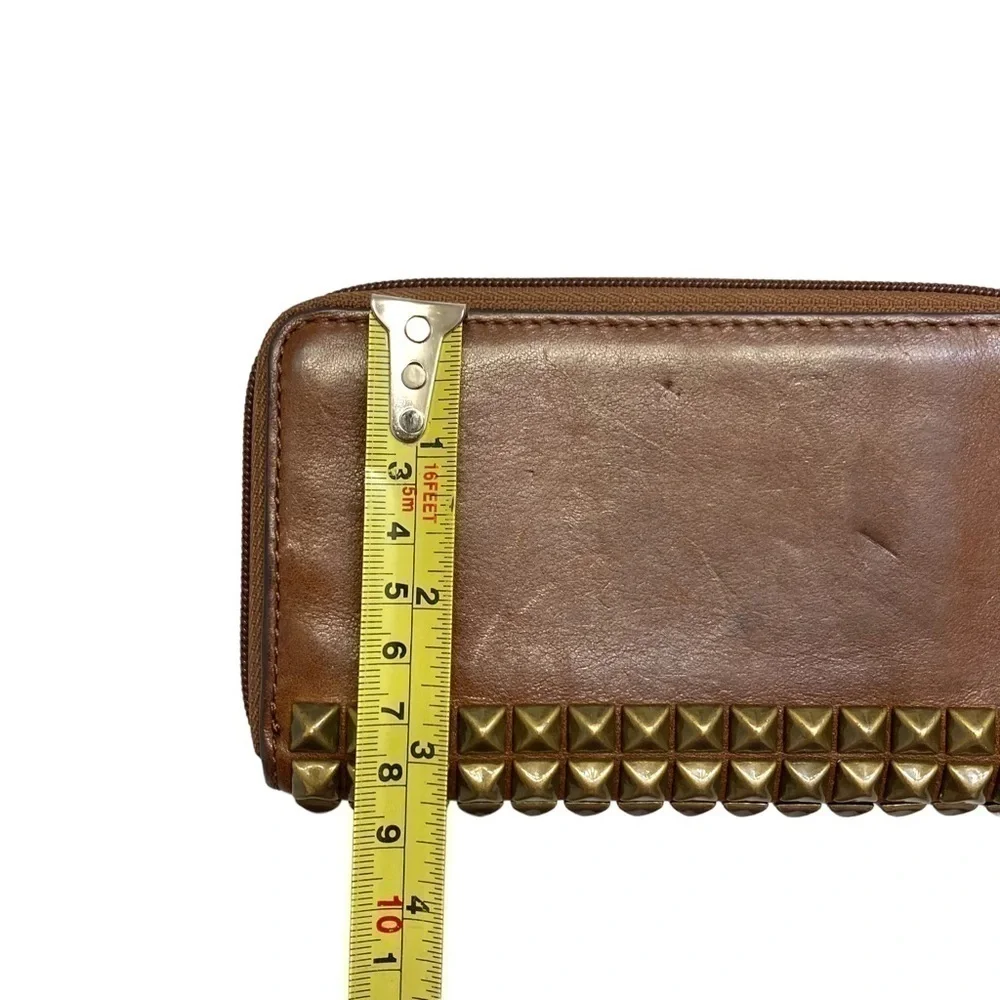 Coach brown weathered leather wristlet wallet